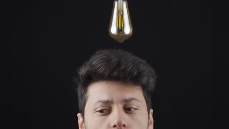 A-lamp-lights-up-above-the-head-of-the-man-who-has-an-idea.-To-generate-ideas.